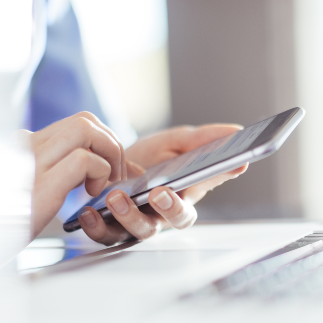 smartphone in a woman's hand